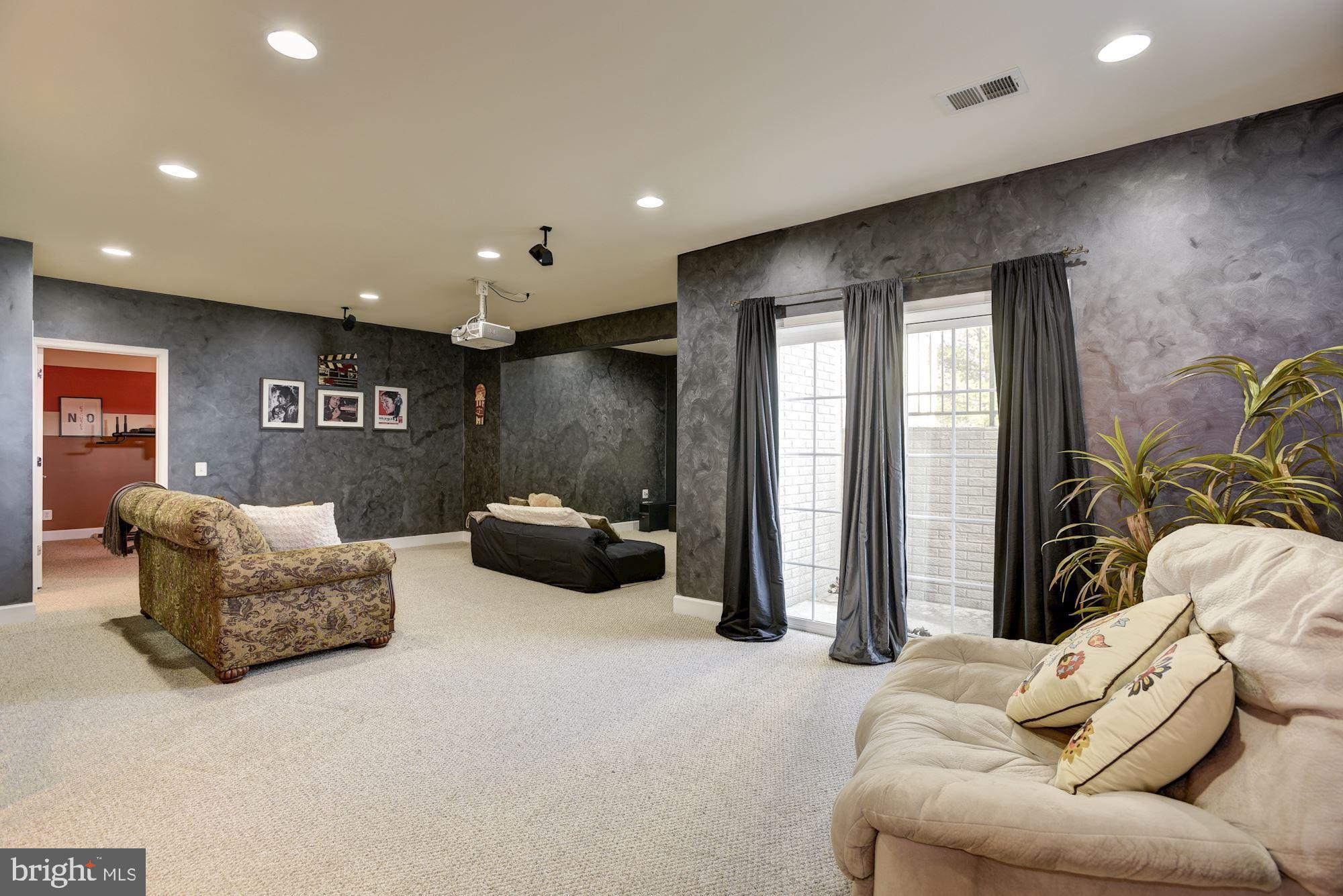 42879 Braemount Circle Ashburn, VA 20148 - Photo 43 of 53 Double sliding glass door lets in abundant light