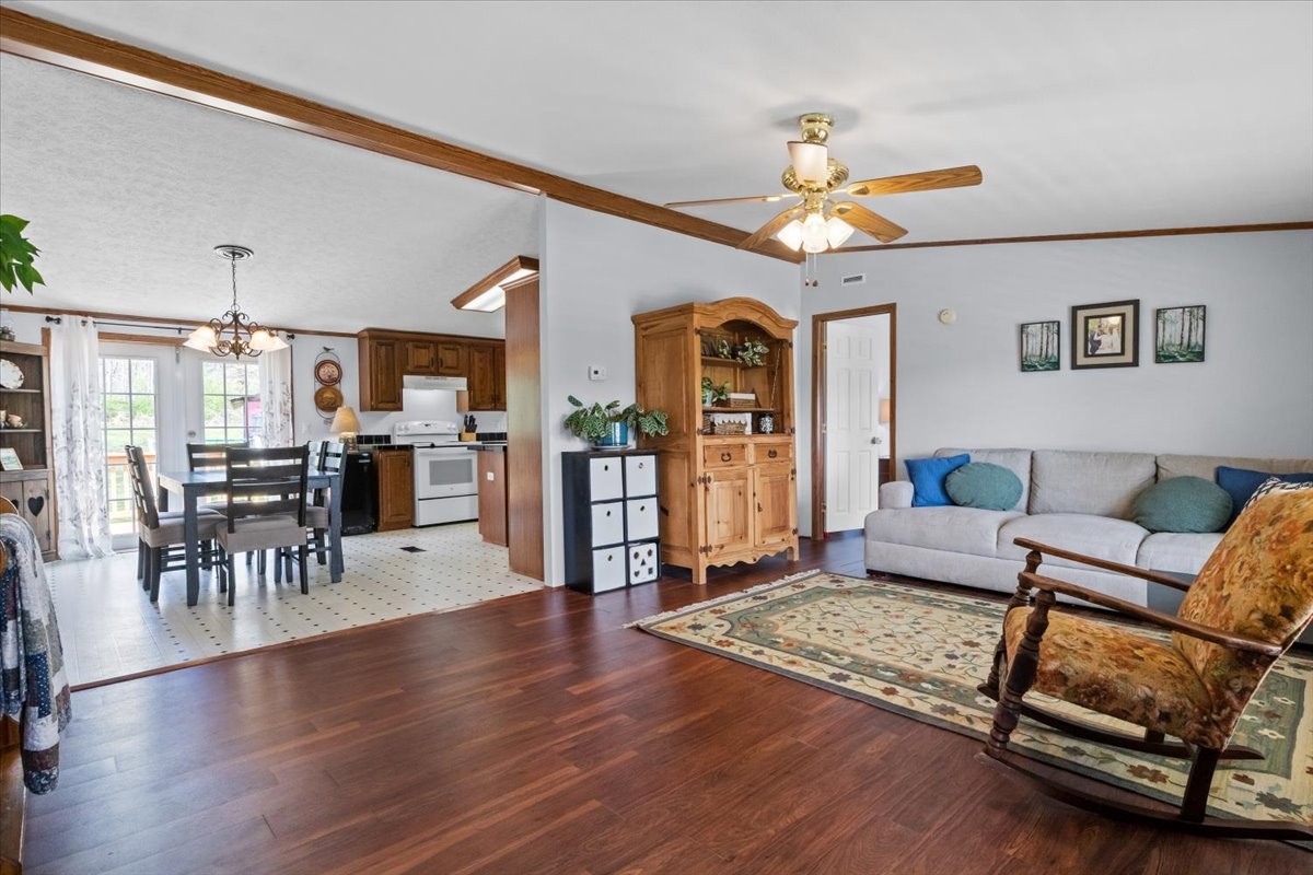1644 West Blue Creek Road Waverly, TN 37185 - Photo 12 of 61 a living room with furniture and wooden floor
