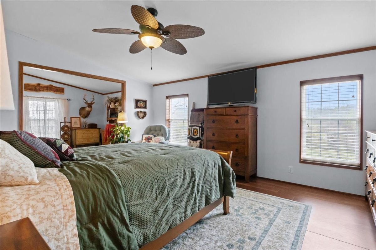 1644 West Blue Creek Road Waverly, TN 37185 - Photo 13 of 61 a bedroom with a bed dresser and a window