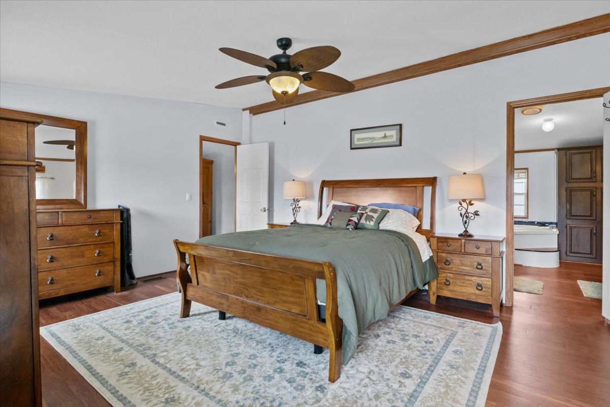 1644 West Blue Creek Road Waverly, TN 37185 - Photo 14 of 61 a bedroom with a bed and a dresser