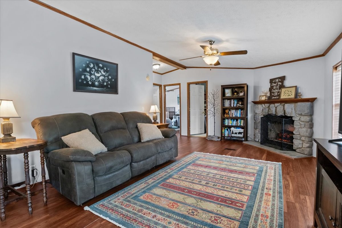 1644 West Blue Creek Road Waverly, TN 37185 - Photo 25 of 61 a living room with furniture and a fireplace