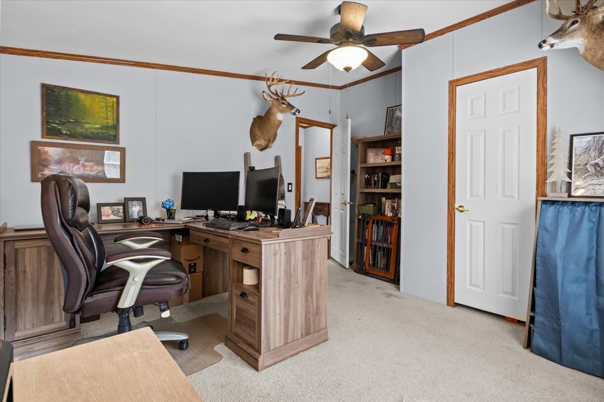 1644 West Blue Creek Road Waverly, TN 37185 - Photo 33 of 61 a view of a workspace with furniture