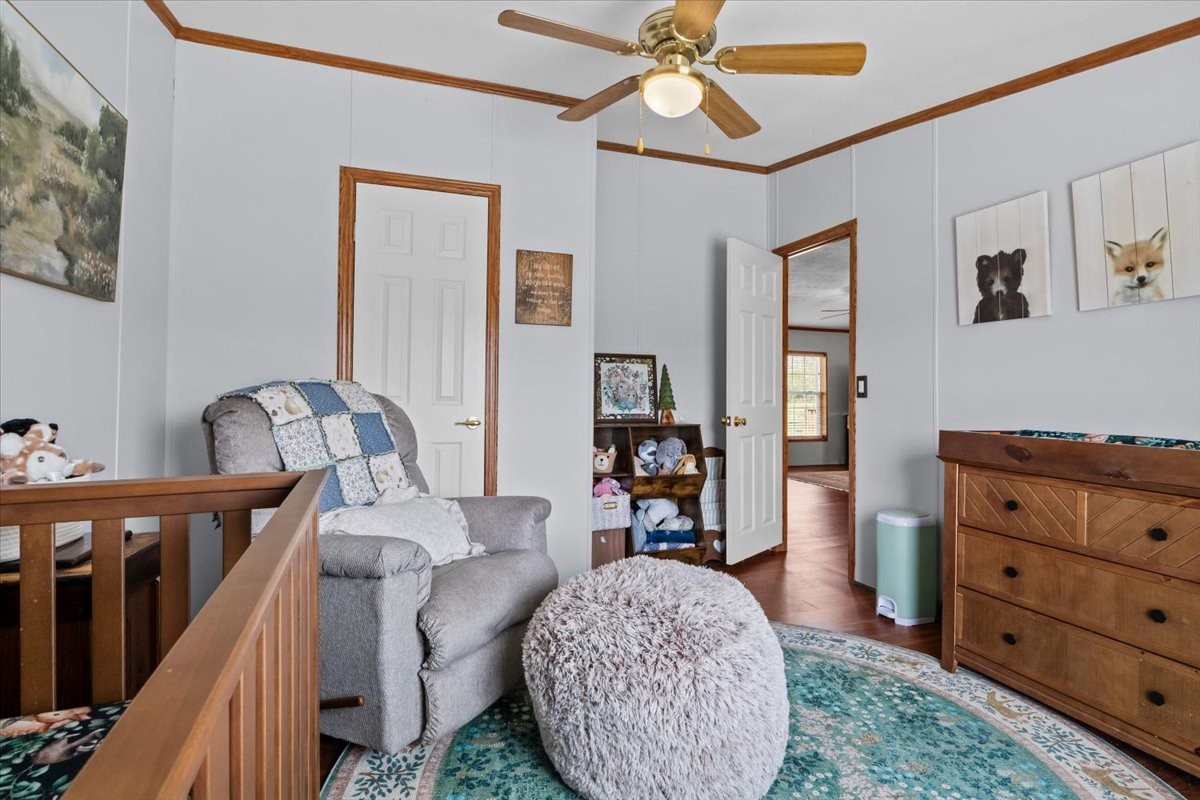 1644 West Blue Creek Road Waverly, TN 37185 - Photo 38 of 61 a living room with furniture and a dresser