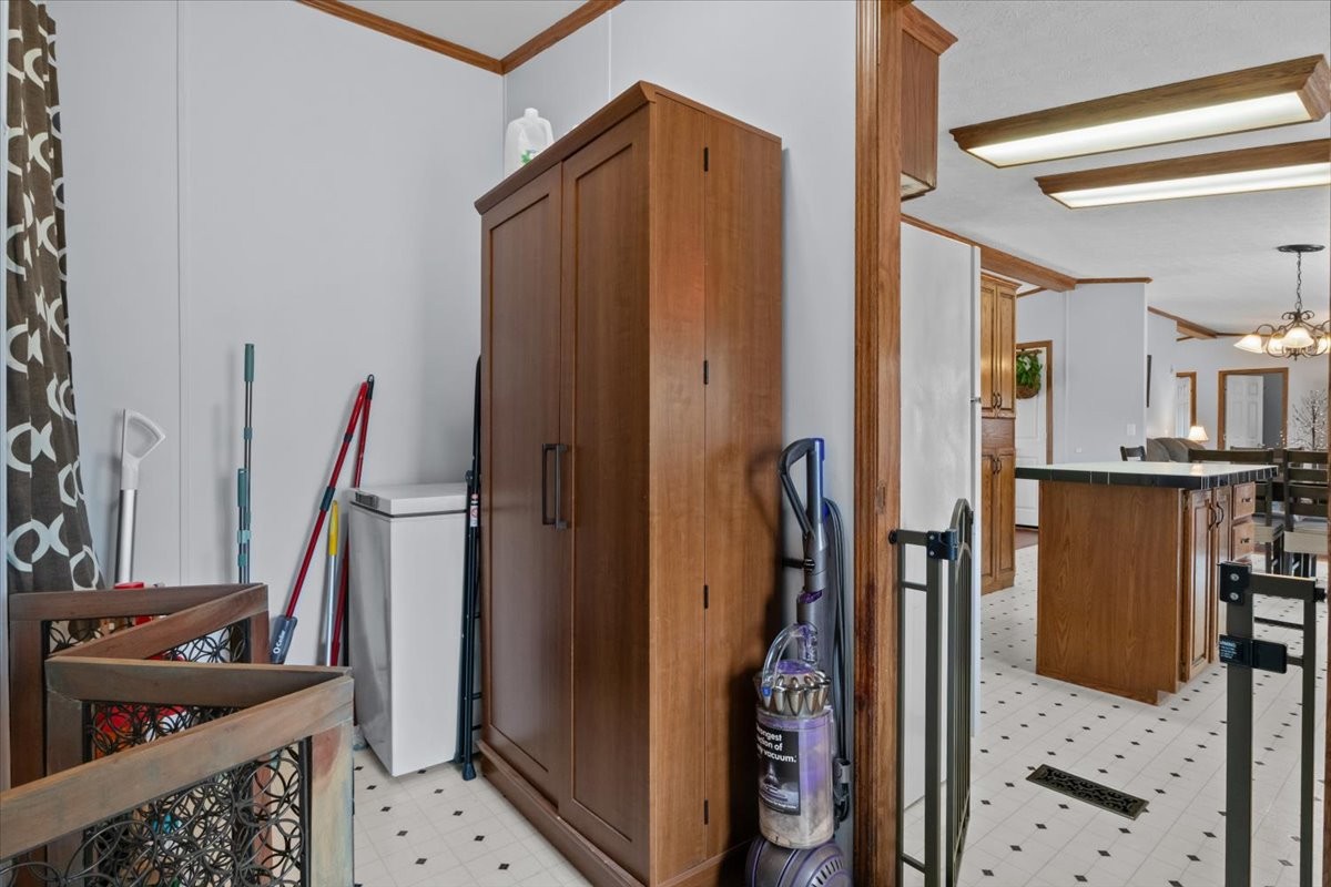 1644 West Blue Creek Road Waverly, TN 37185 - Photo 40 of 61 a view of walk in closet with clothes and shoes