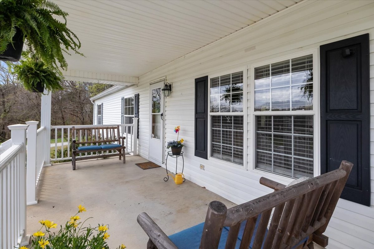 1644 West Blue Creek Road Waverly, TN 37185 - Photo 4 of 61 a view of balcony with a potted plant and stairs