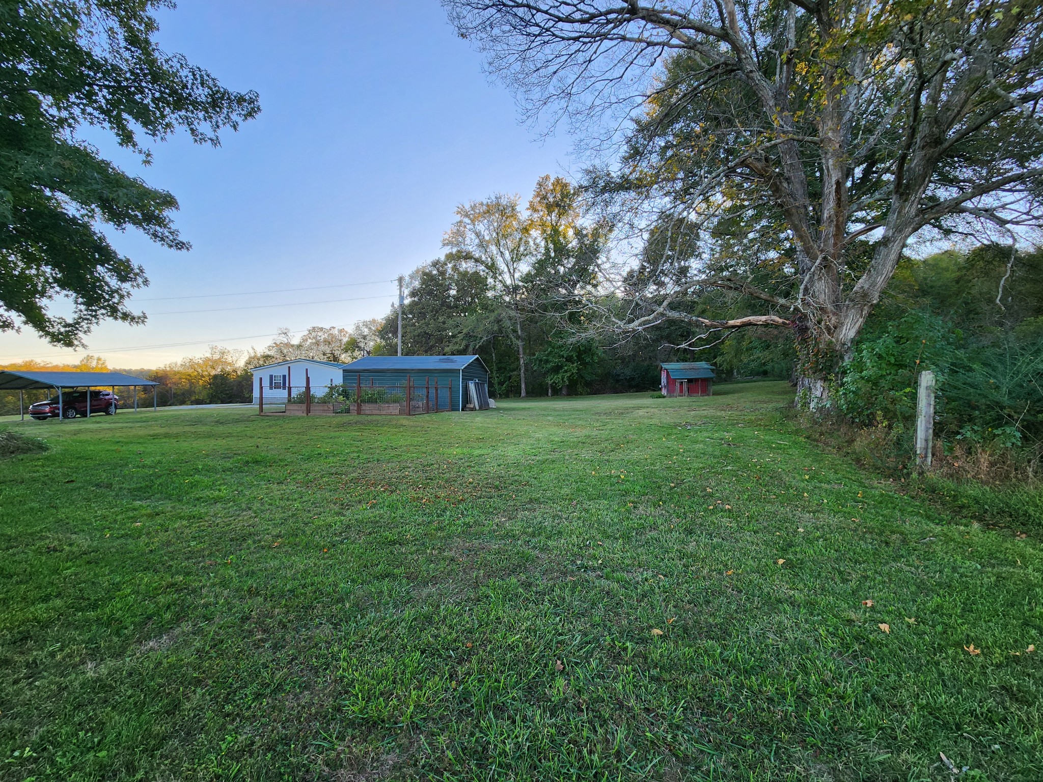 1644 West Blue Creek Road Waverly, TN 37185 - Photo 57 of 61 a view of a house with a yard