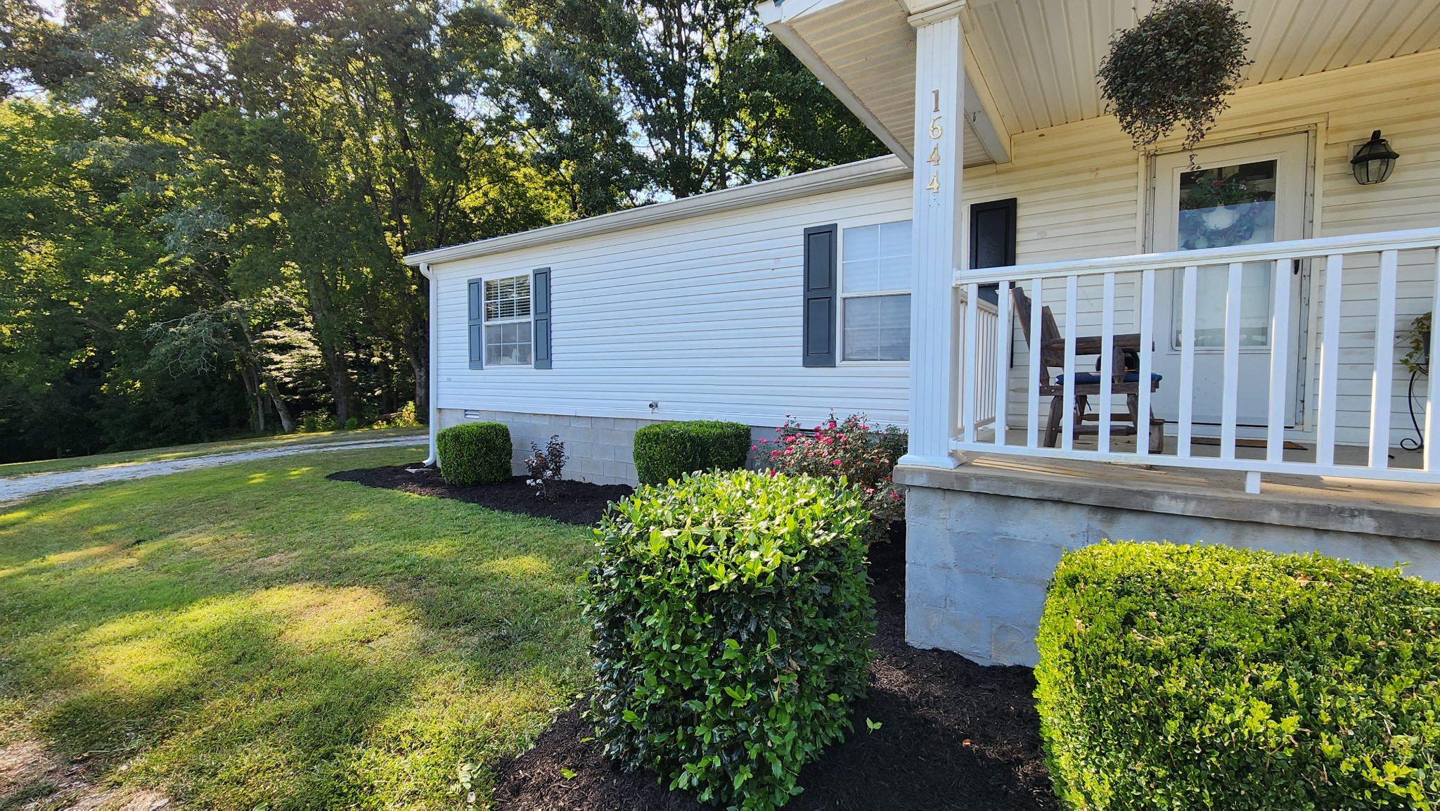 1644 West Blue Creek Road Waverly, TN 37185 - Photo 6 of 61 a view of a house with backyard and sitting area