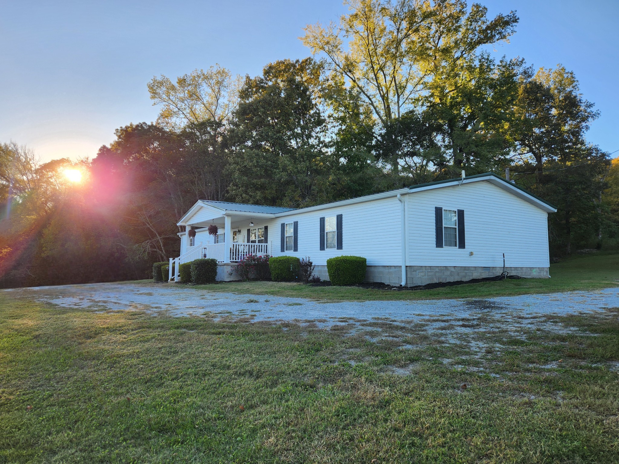 1644 West Blue Creek Road Waverly, TN 37185 - Photo 8 of 61 a view of a house with a yard