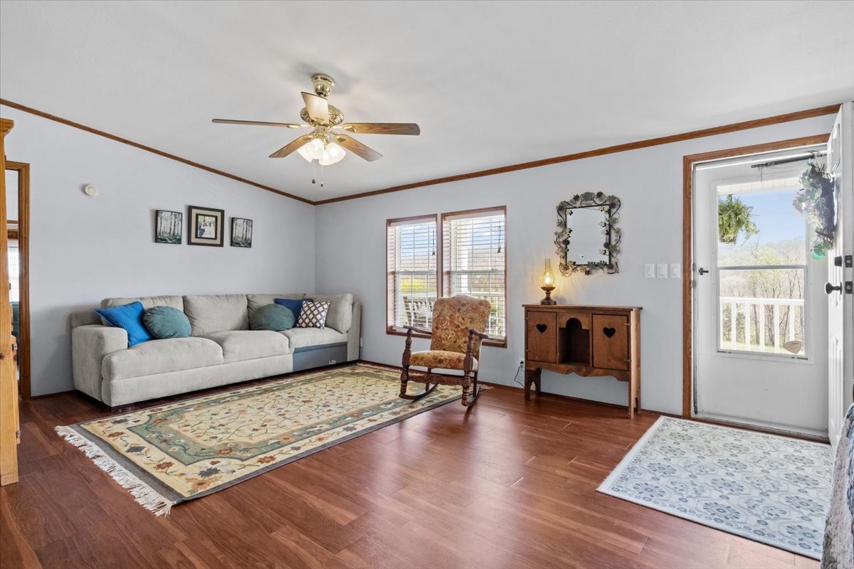 1644 West Blue Creek Road Waverly, TN 37185 - Photo 10 of 61 a living room with furniture and a window