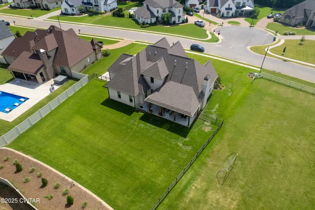 swimming pool with trees in the background
