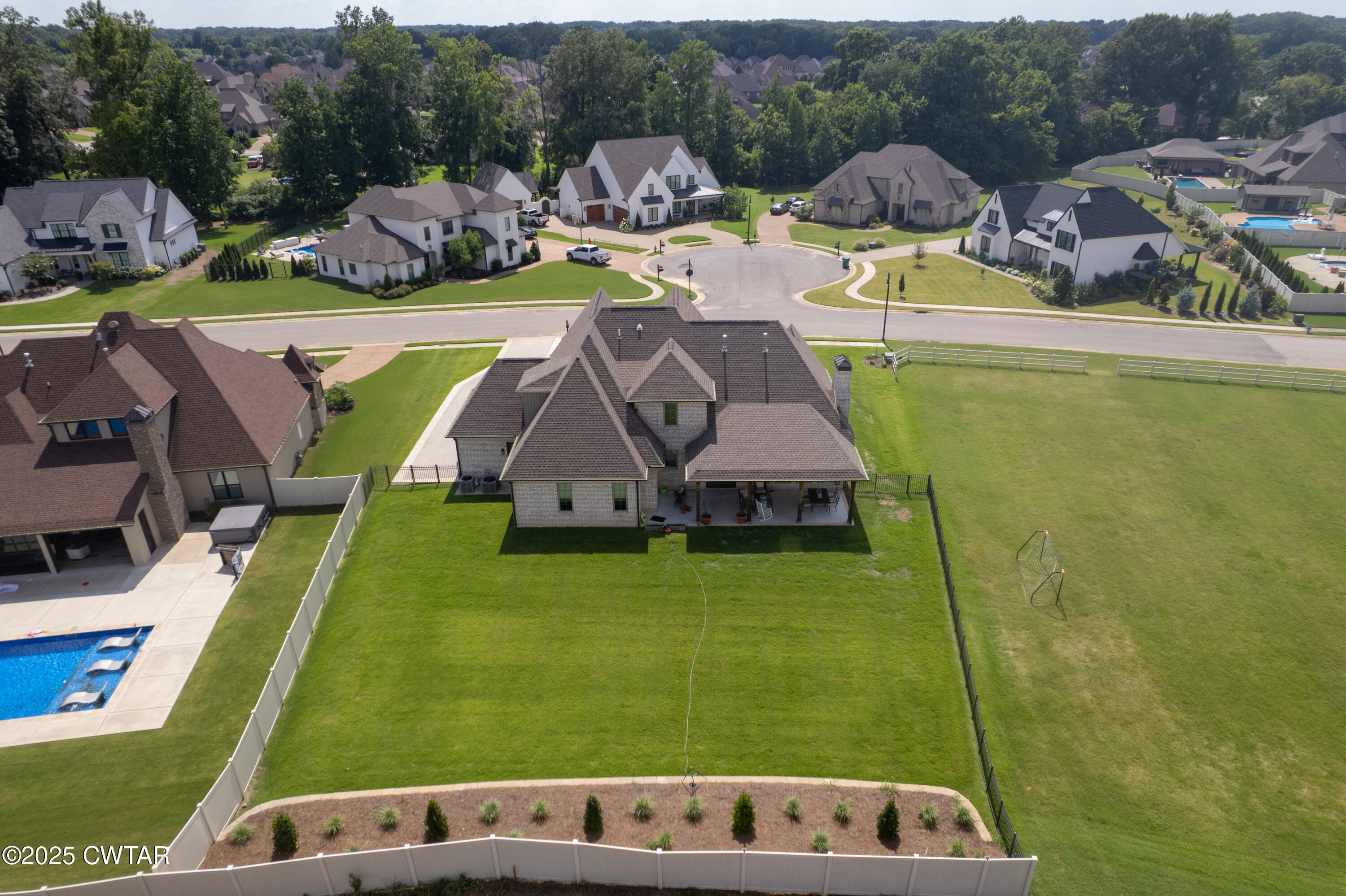 52 Buckingham Cove Jackson, TN 38305 - Photo 6 of 33 a view of swimming pool with a patio
