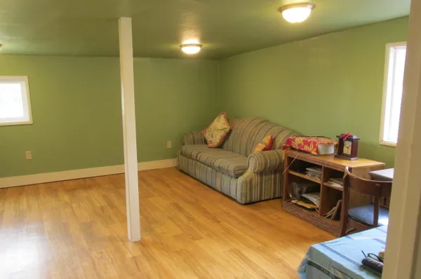 a living room with a couch and a table