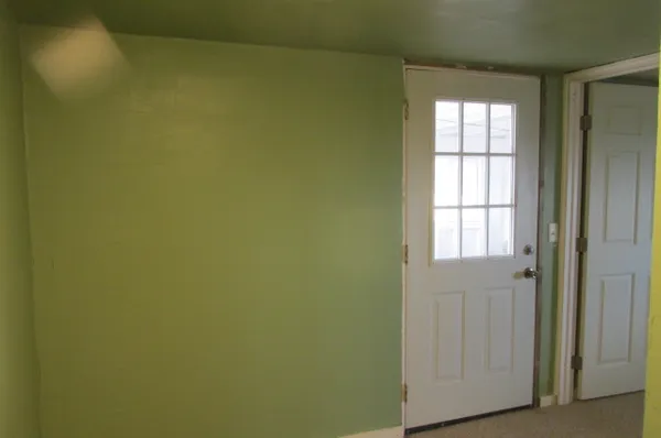 an empty room with windows
