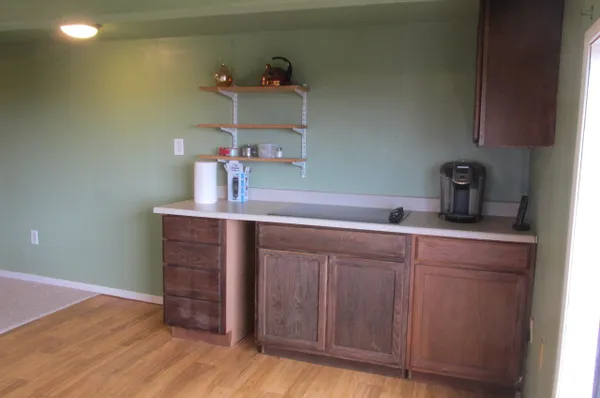 a kitchen with a sink and cabinets
