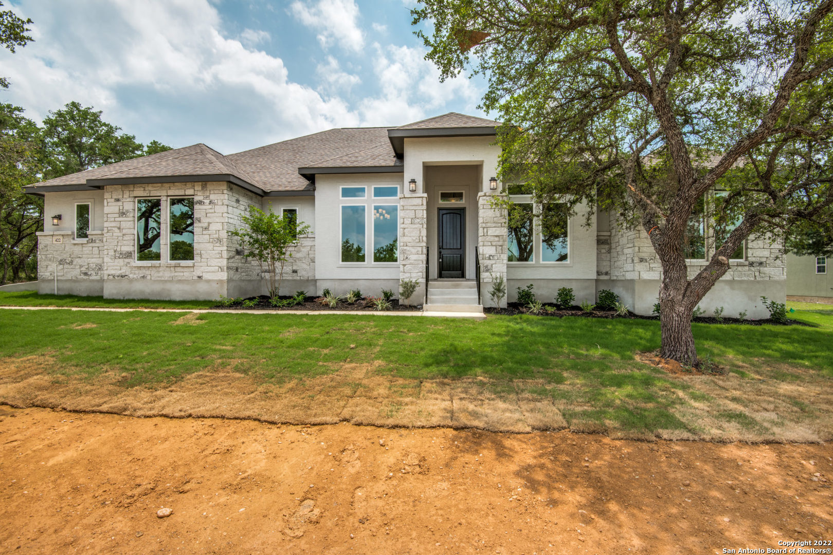 361 Warbler Drive Spring Branch, TX 78070 - Photo 1 of 1 a front view of a house with garden