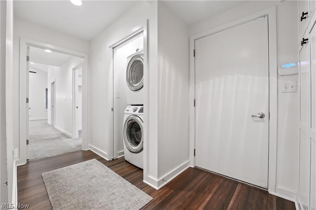 263 East Pine Lake Road North Lima, OH 44452 - Photo 25 of 50 Laundry nook with dark wood-type flooring and stacked washer / drying machine