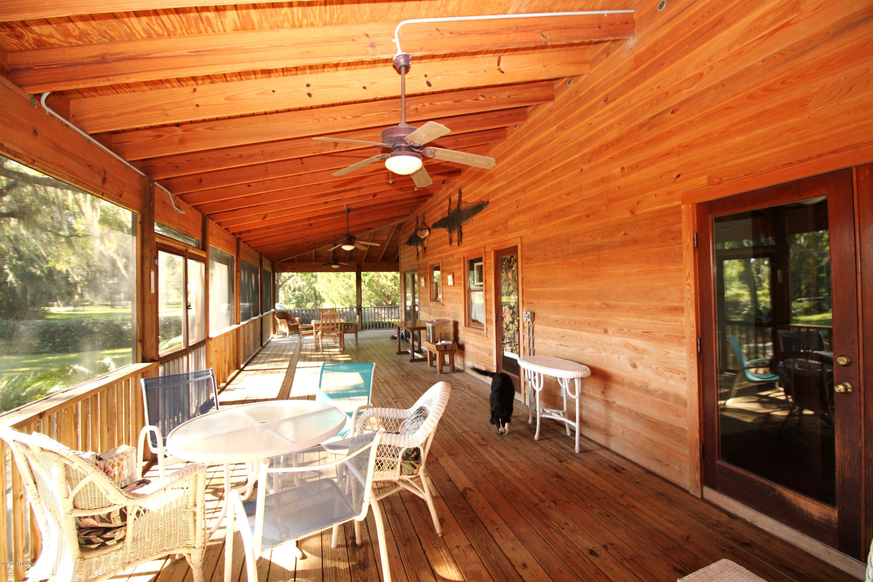 6105 Solano Creek Road Elkton, FL 32033 - Photo 20 of 77 Pool Side Porch