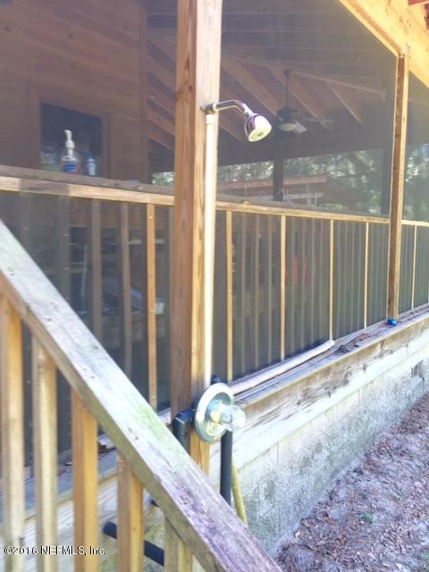6105 Solano Creek Road Elkton, FL 32033 - Photo 23 of 77 outdoor shower main house