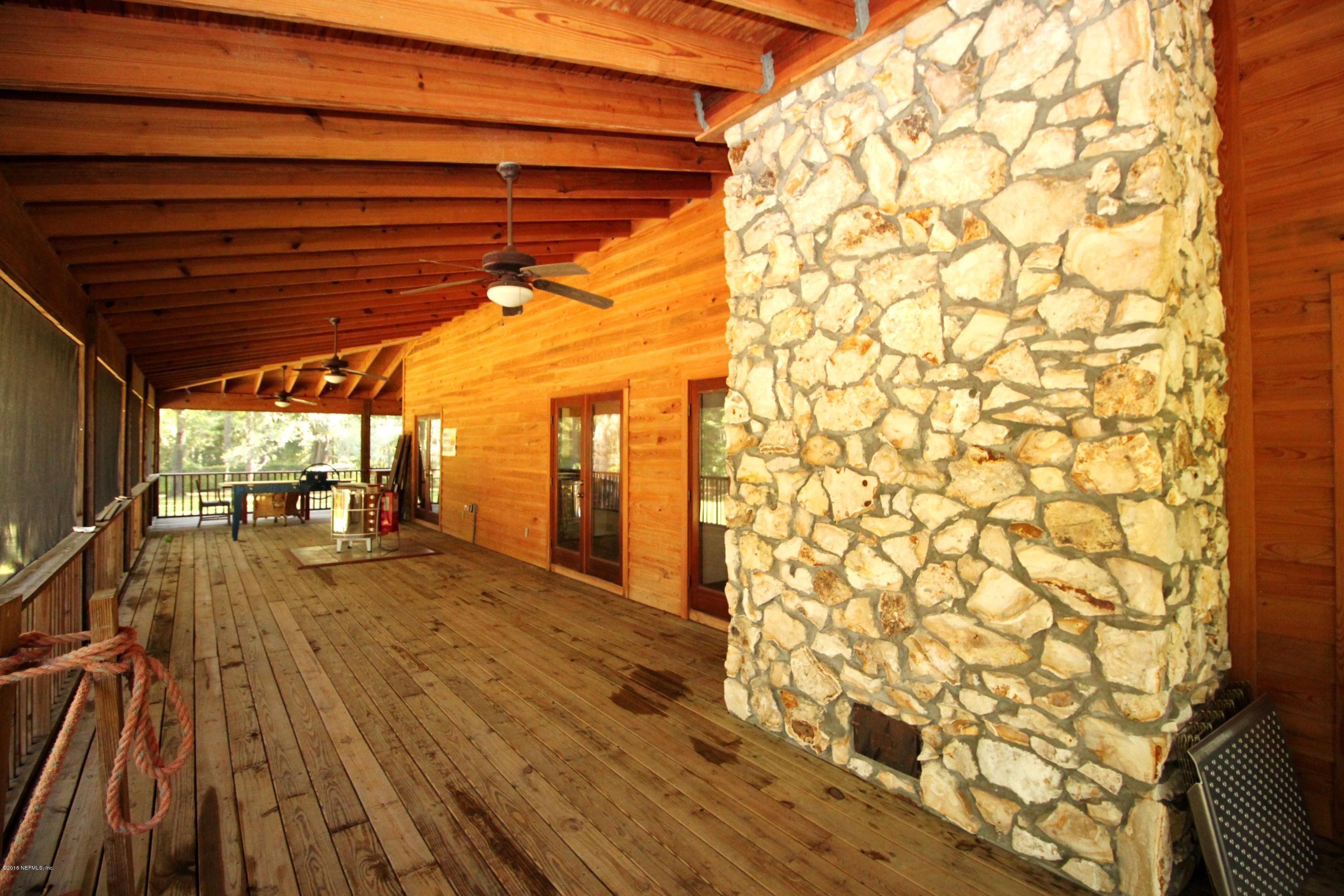 6105 Solano Creek Road Elkton, FL 32033 - Photo 24 of 77 Porch behind Living Room