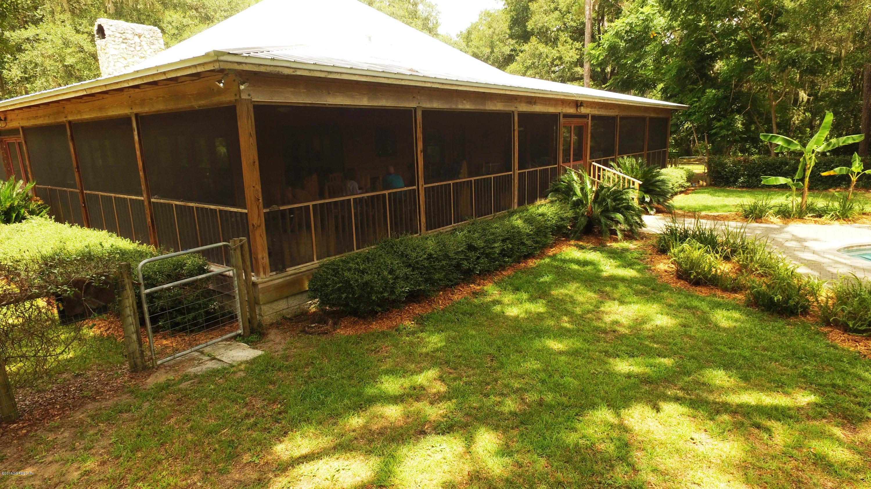 6105 Solano Creek Road Elkton, FL 32033 - Photo 35 of 77 Pool Side of home