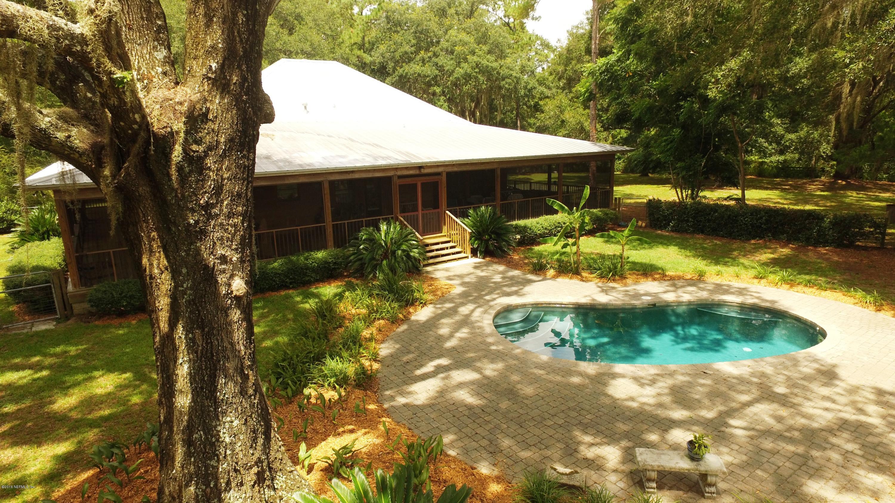 6105 Solano Creek Road Elkton, FL 32033 - Photo 4 of 77 From Porch to Pool