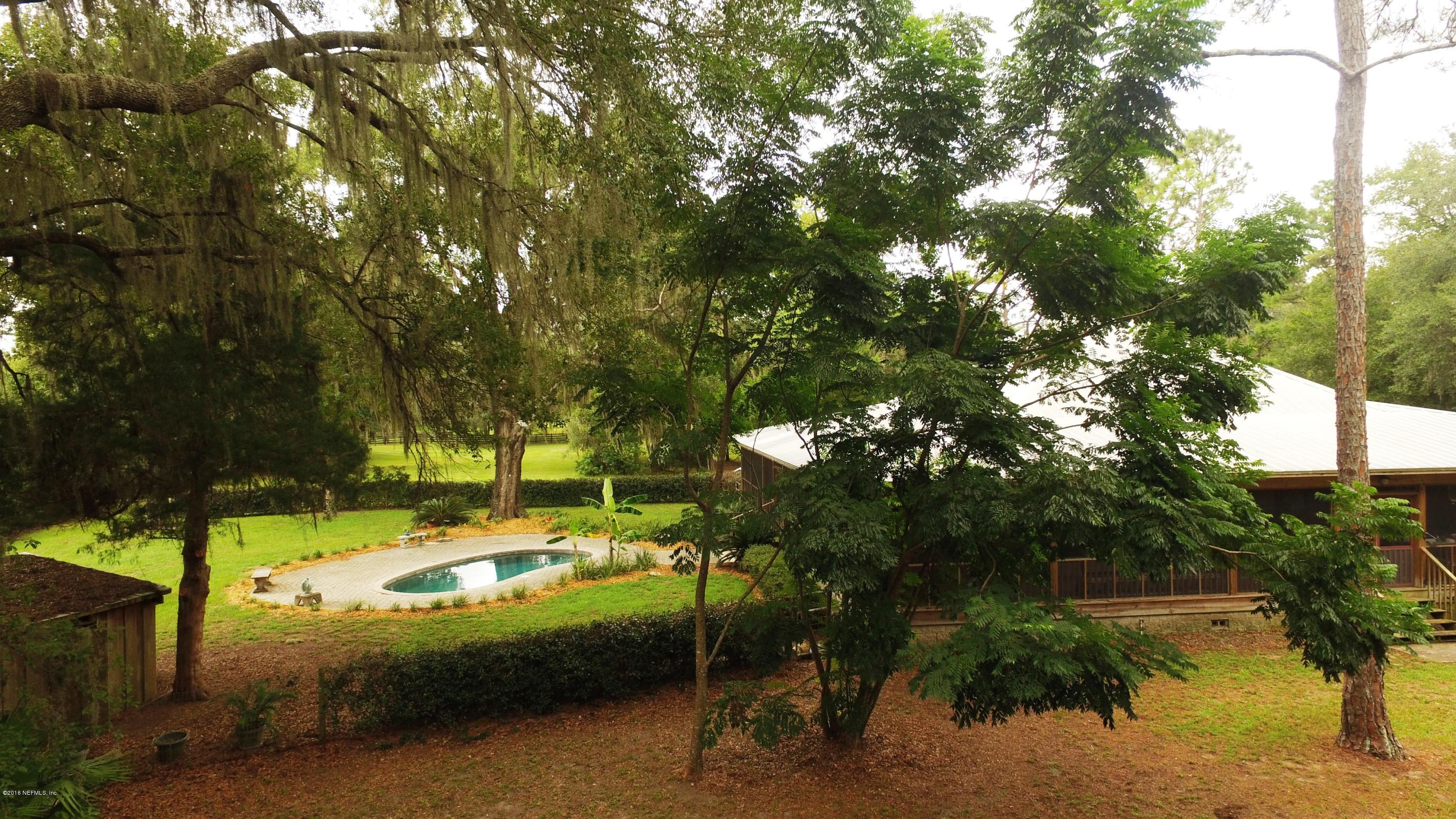 6105 Solano Creek Road Elkton, FL 32033 - Photo 5 of 77 House & Pool Nestled in Trees