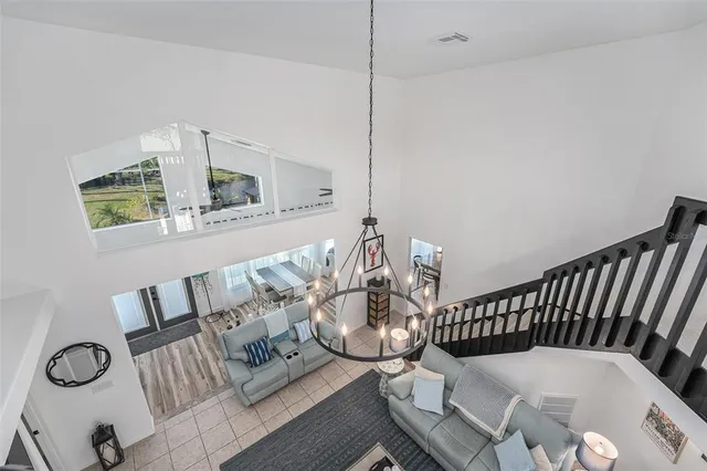 a view of living room and wooden floor