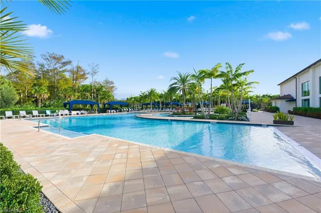 a view of swimming pool from a yard