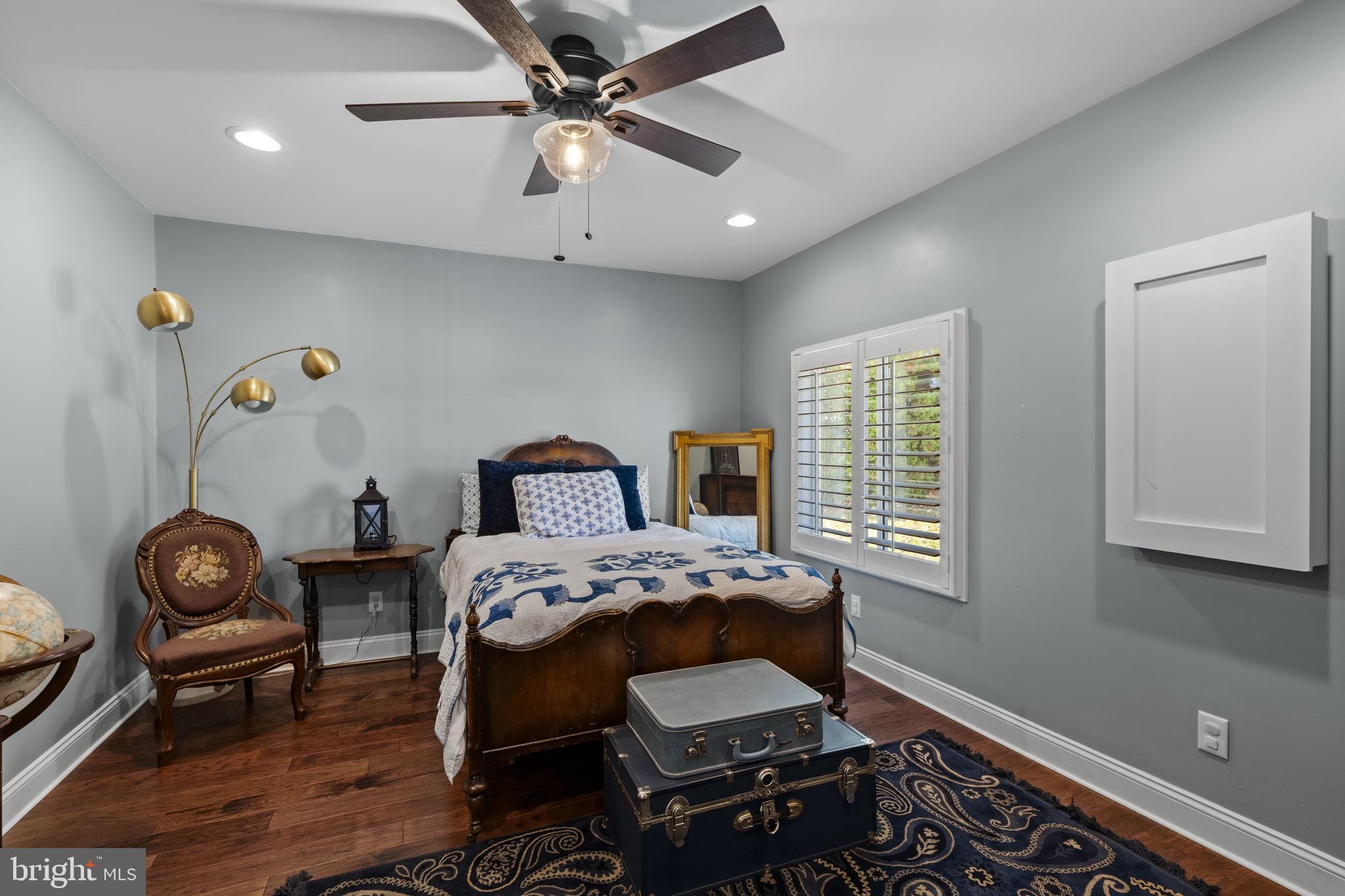 3 Dutton Court York, PA 17402 - Photo 11 of 30 a bedroom with a bed and a chandelier