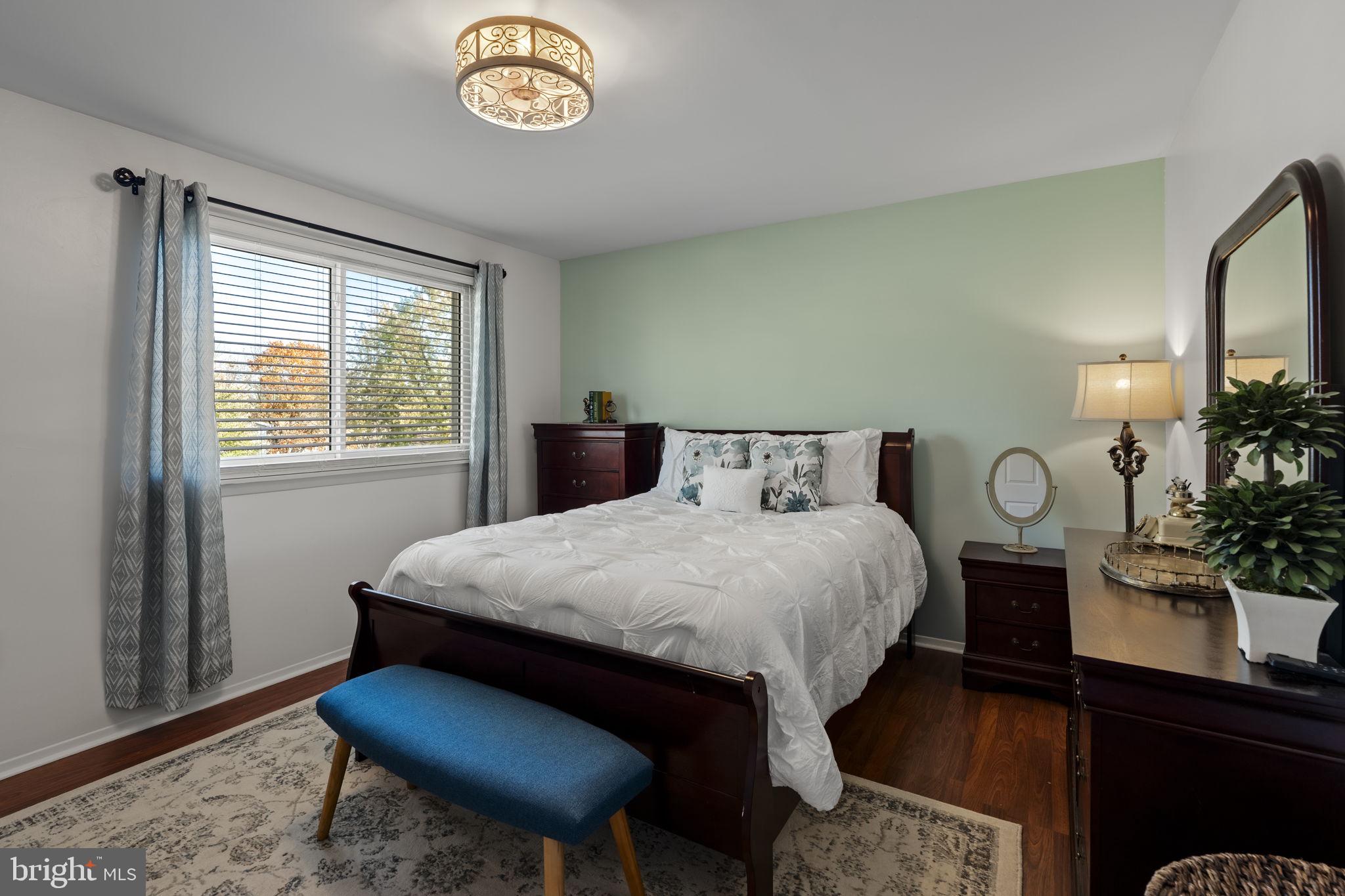 3 Dutton Court York, PA 17402 - Photo 13 of 30 a bedroom with a bed and a table