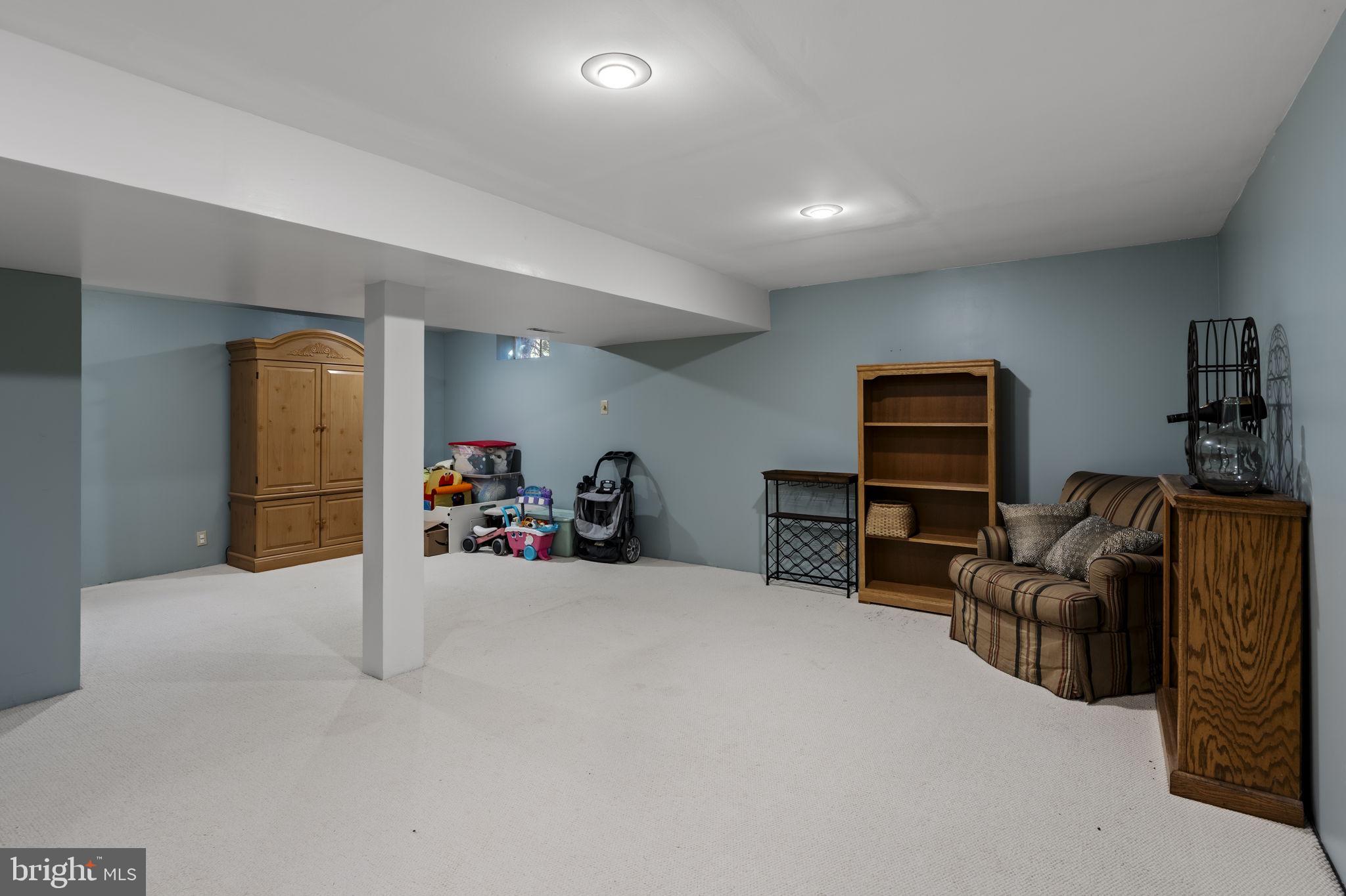 3 Dutton Court York, PA 17402 - Photo 19 of 30 a view of a livingroom with furniture and toys