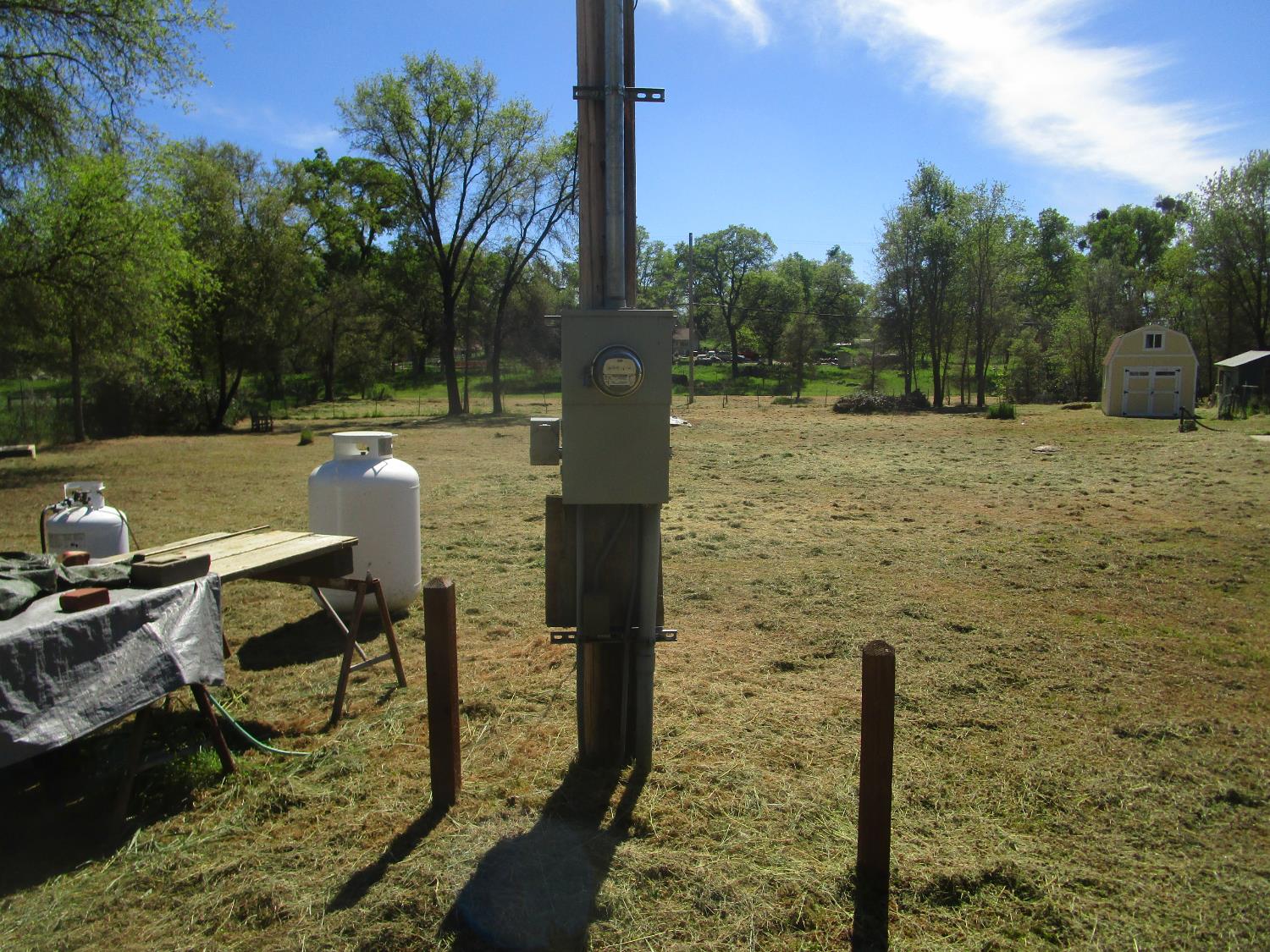 10410 Valley Drive Rough and Ready, CA 95975 - Photo 28 of 31 a lake view with a bench