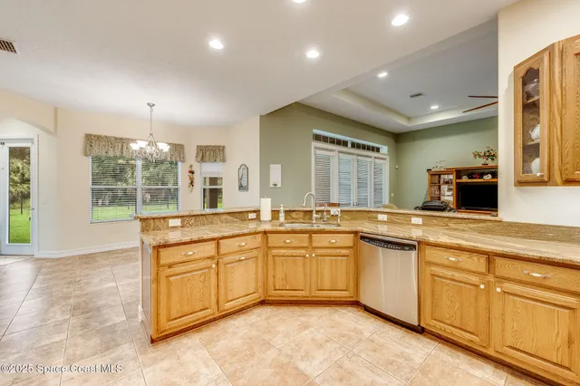 a view of a kitchen with appliances and cabinets