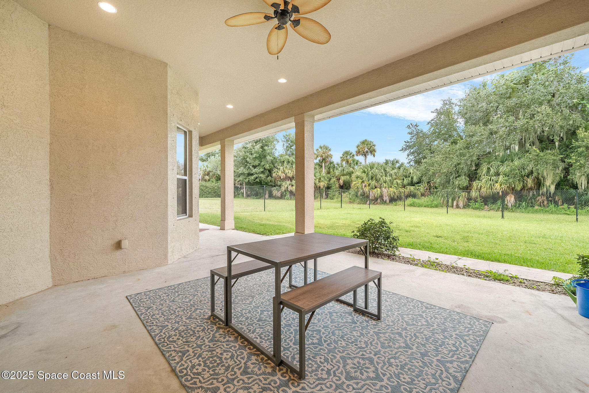 2800 Parrish Road Titusville, FL 32796 - Photo 33 of 45 a sitting area with furniture and a garden