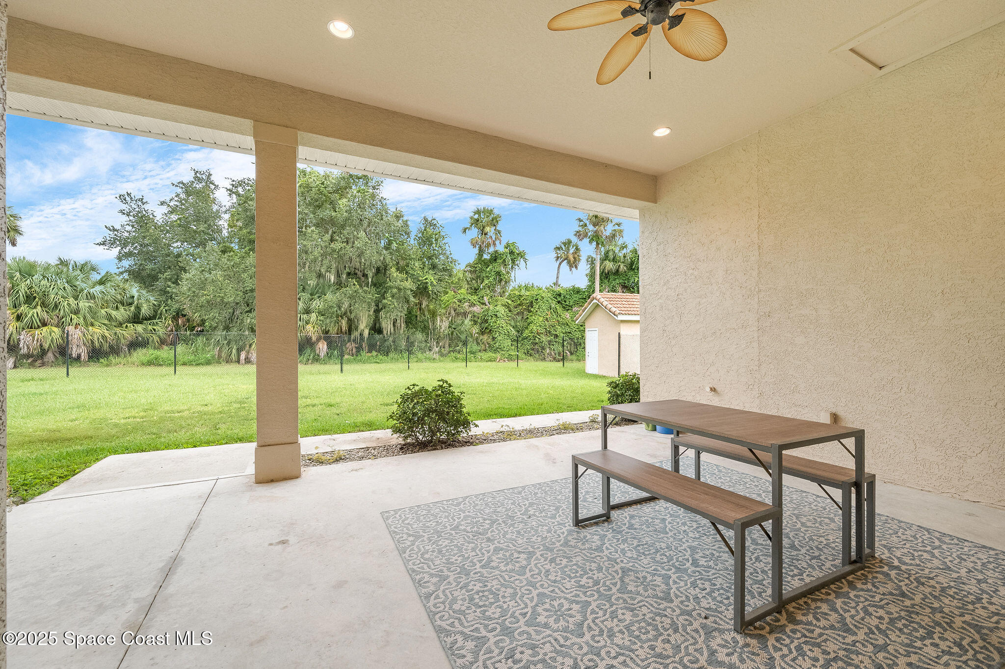 2800 Parrish Road Titusville, FL 32796 - Photo 34 of 45 a sitting area with furniture and garden view