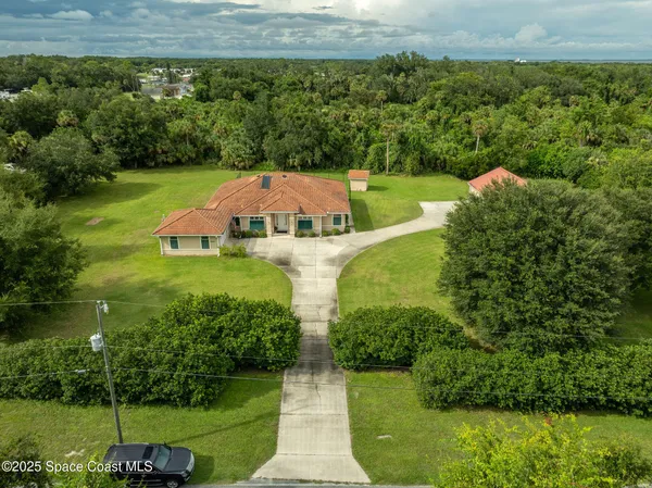 a view of a lake with a yard