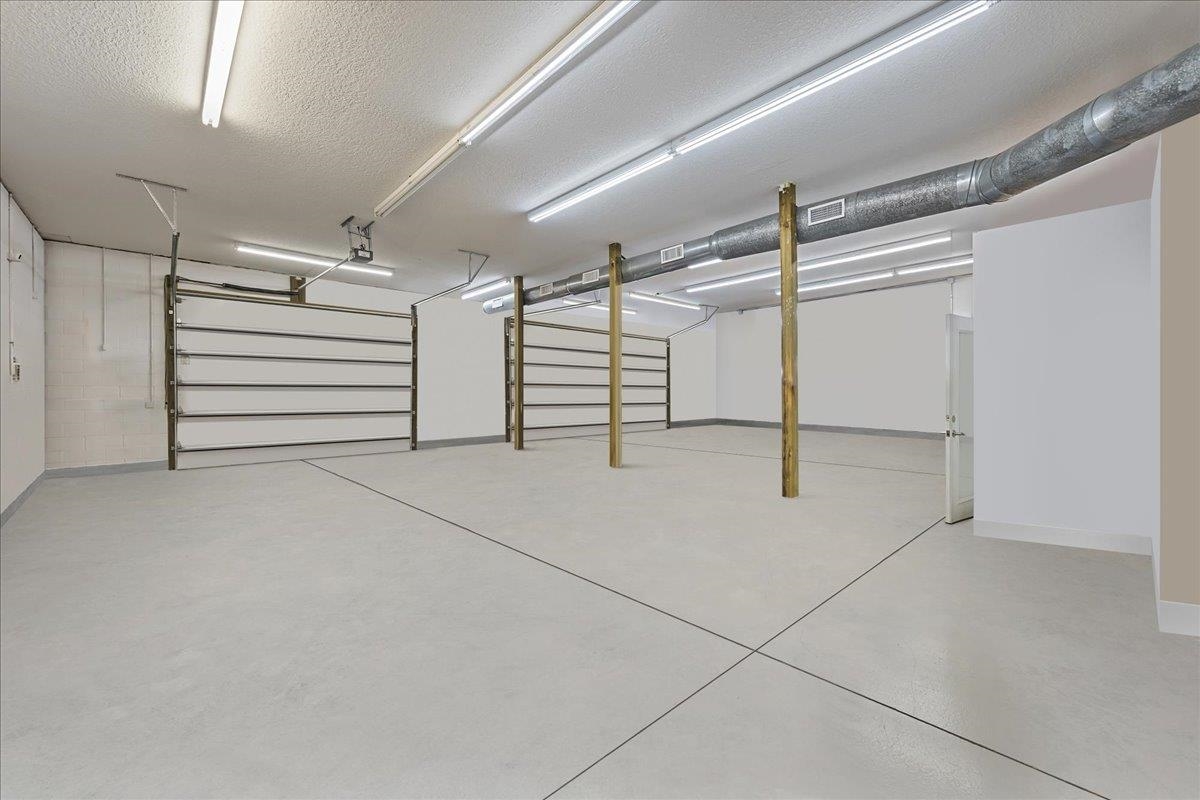 736-8 Kings Estate Road St. Augustine, FL 32086 - Photo 16 of 40 Garage featuring baseboards