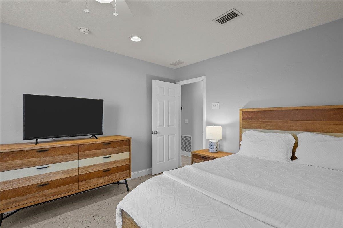736-8 Kings Estate Road St. Augustine, FL 32086 - Photo 27 of 40 Bedroom with ceiling fan and recessed lighting