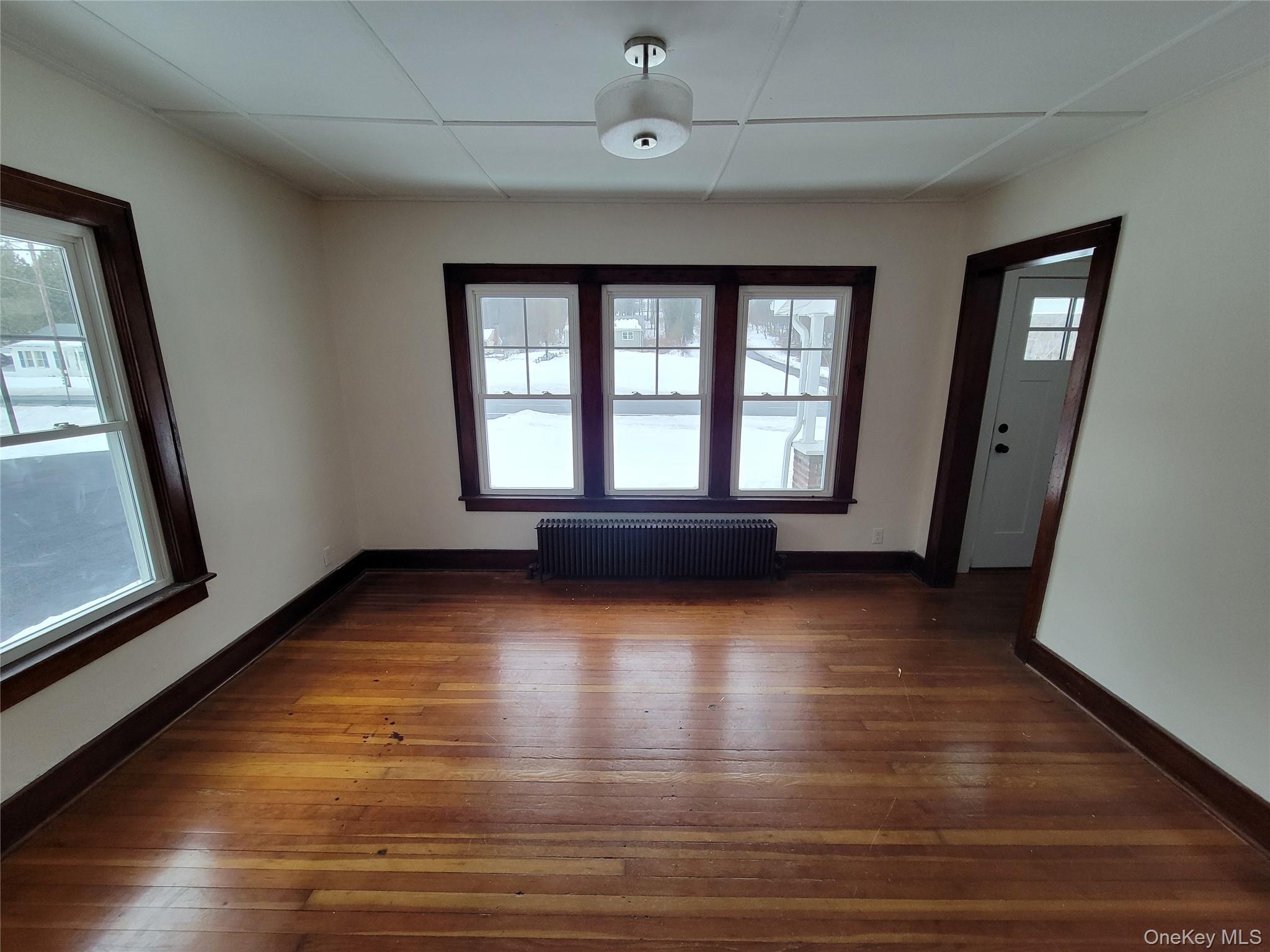 712 State Route 52 Walden, NY 12586 - Photo 13 of 21 a view of empty room with wooden floor and fan