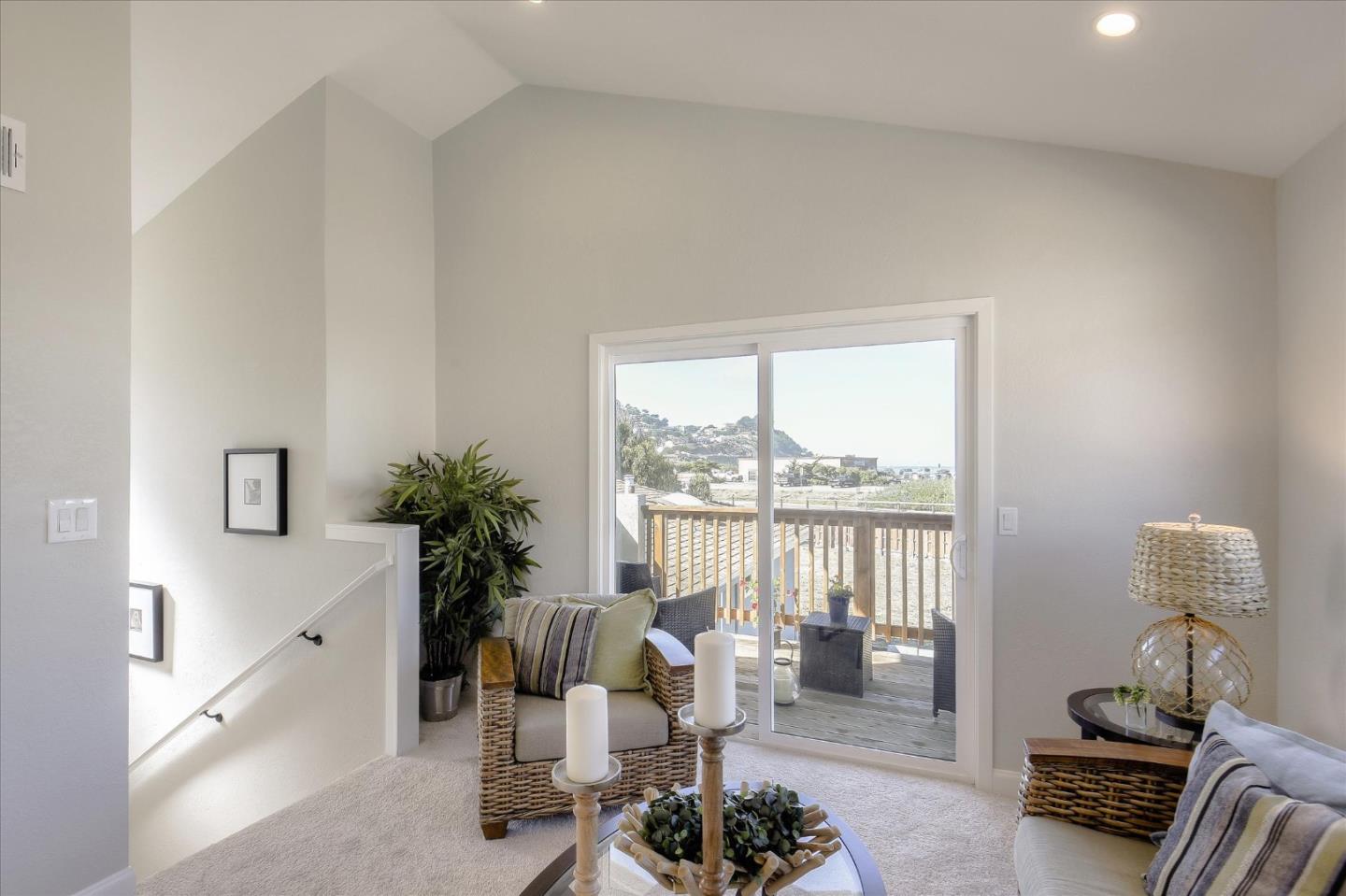 504 Arguello Boulevard Pacifica, CA 94044 - Photo 15 of 42 a living room with furniture and a large window