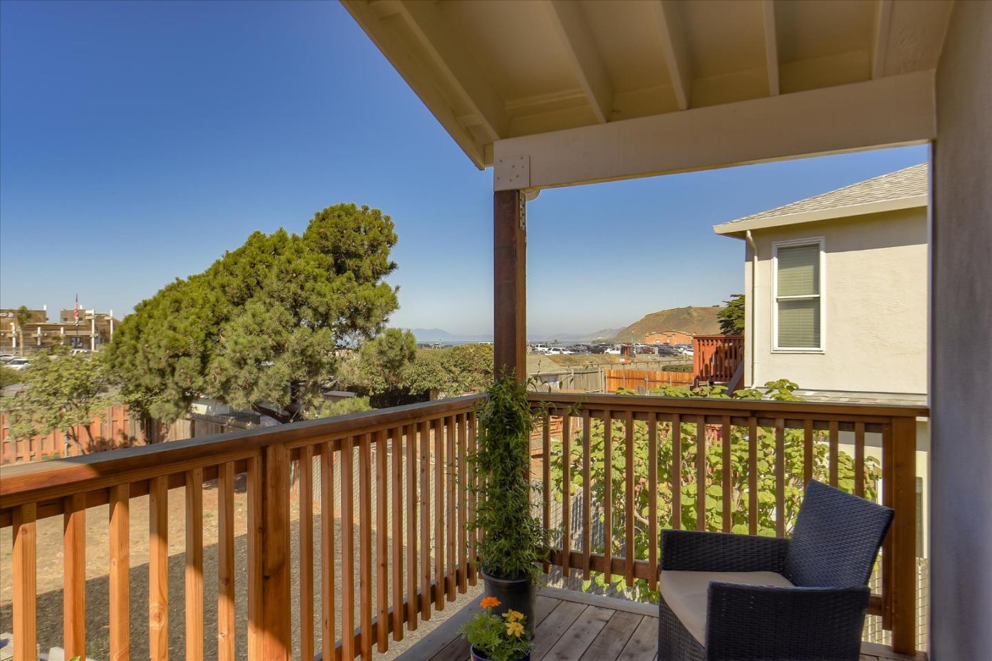 504 Arguello Boulevard Pacifica, CA 94044 - Photo 18 of 42 a view of a chair and table in the balcony