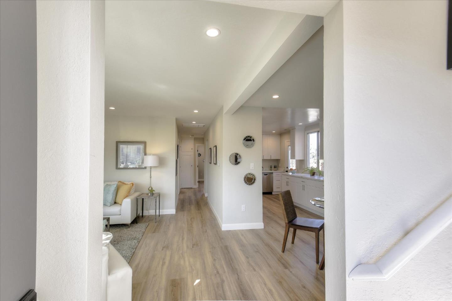 504 Arguello Boulevard Pacifica, CA 94044 - Photo 24 of 42 a en suite bathroom with a sink and a mirror