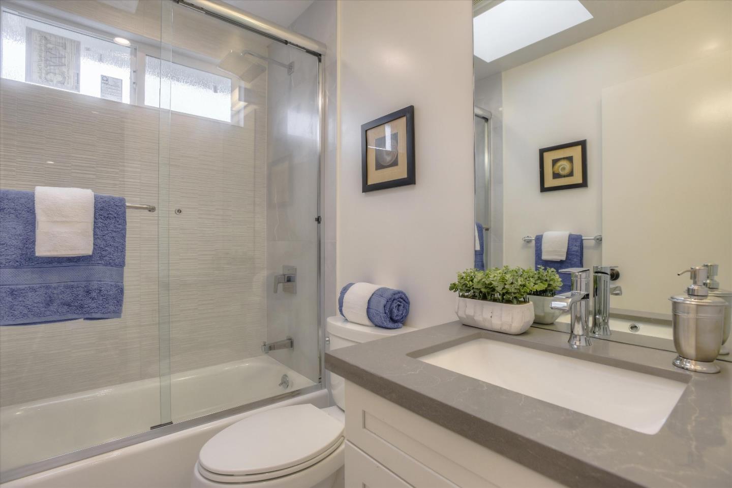 504 Arguello Boulevard Pacifica, CA 94044 - Photo 28 of 42 a bathroom with a sink a toilet and shower