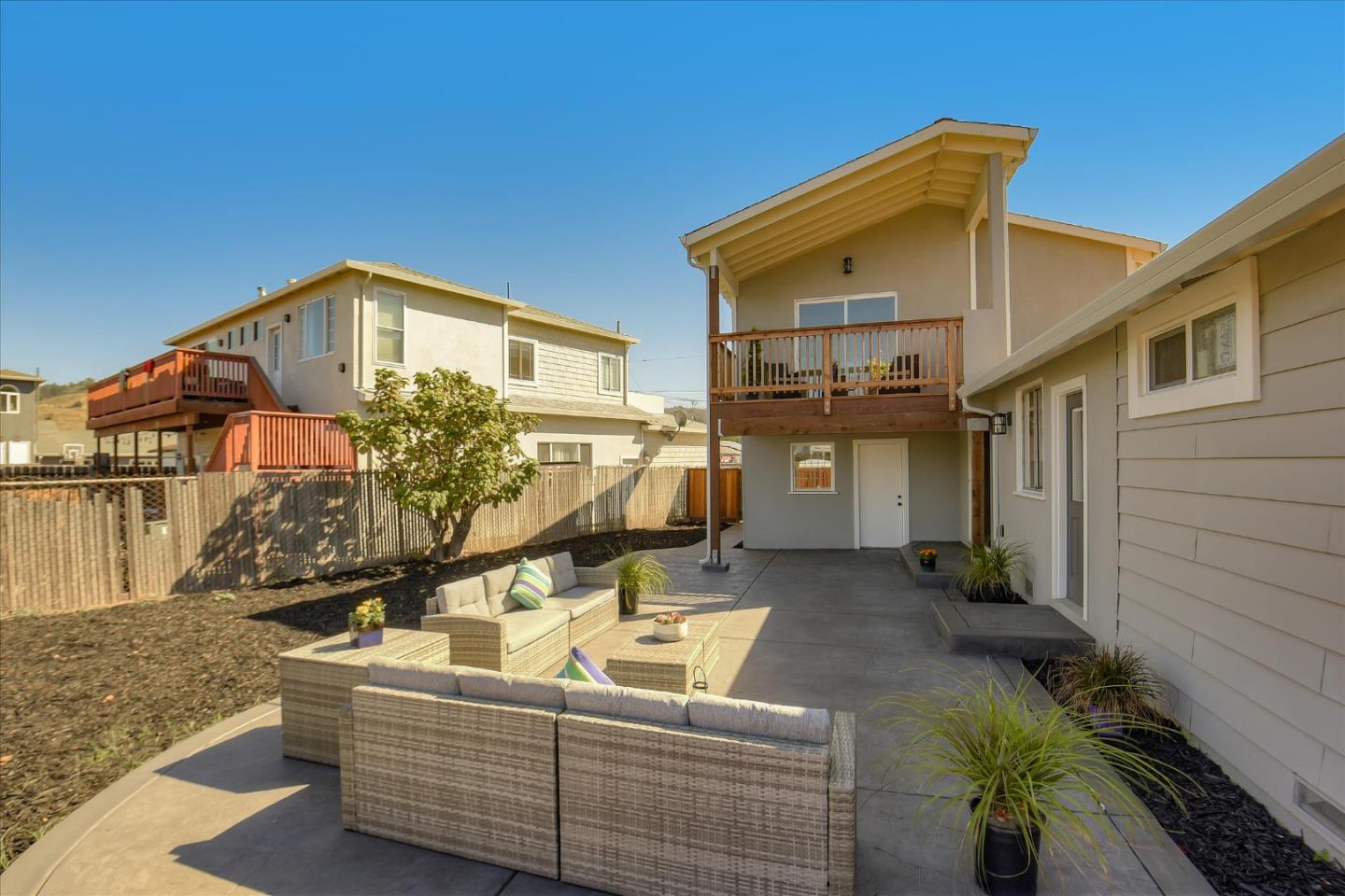 504 Arguello Boulevard Pacifica, CA 94044 - Photo 34 of 42 a front view of a house with outdoor seating