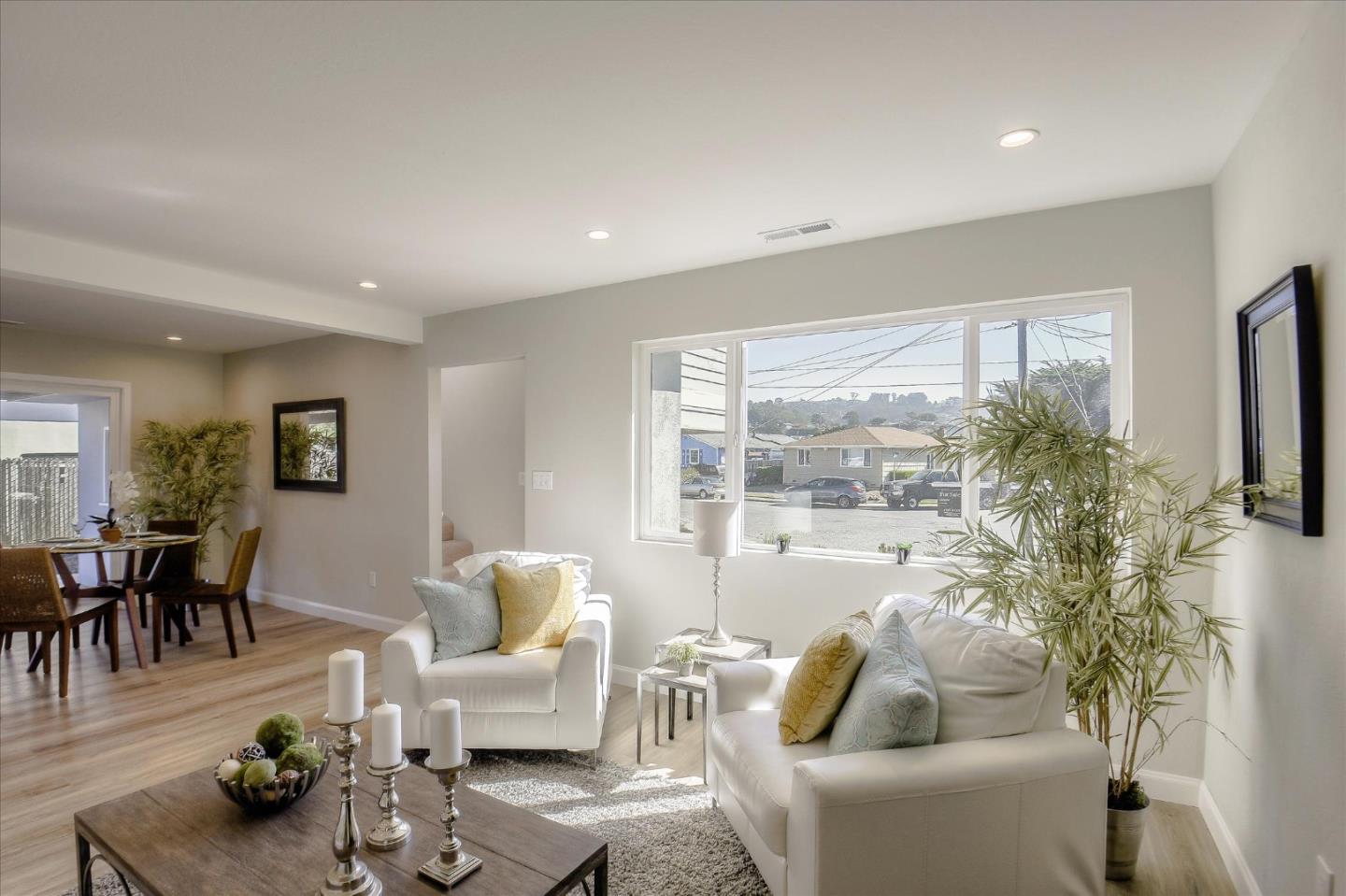 504 Arguello Boulevard Pacifica, CA 94044 - Photo 5 of 42 a living room with furniture and a large window