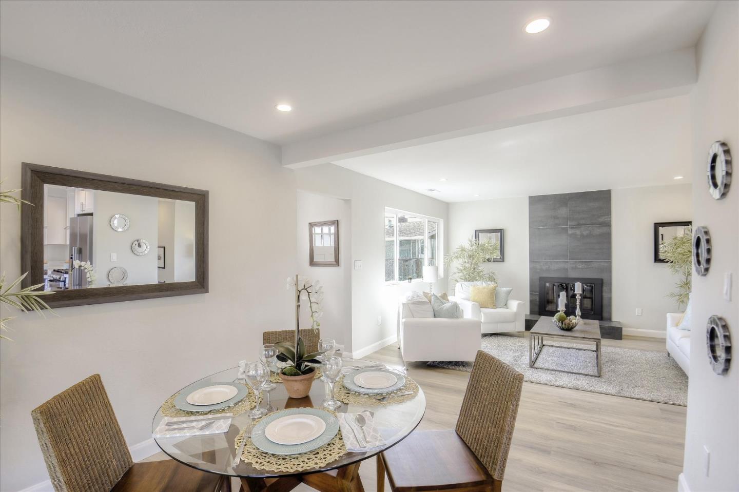 504 Arguello Boulevard Pacifica, CA 94044 - Photo 6 of 42 a view of a dining room with furniture and wooden floor