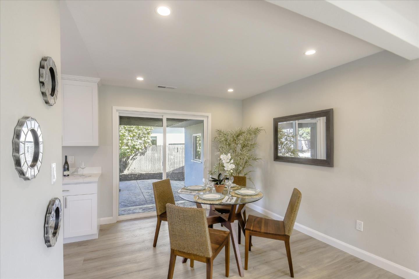 504 Arguello Boulevard Pacifica, CA 94044 - Photo 7 of 42 a view of a dining room with furniture and a window