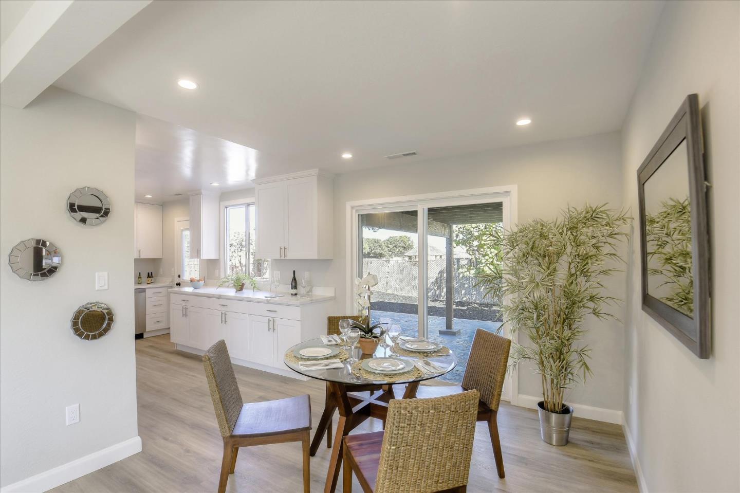 504 Arguello Boulevard Pacifica, CA 94044 - Photo 8 of 42 a view of a dining room with furniture and wooden floor