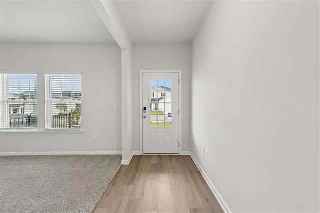 an empty room with windows