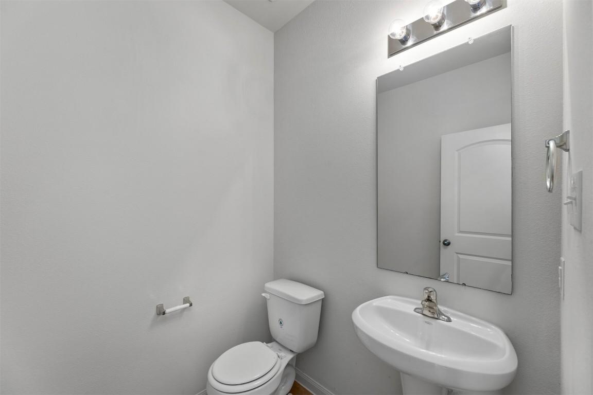 9715 Blue Sapphire Lane Rosharon, TX 77583 - Photo 15 of 30 Downstairs half bath